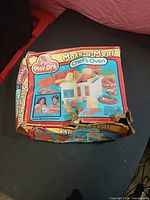 Front view of damaged Play-Doh Make-a-Meal Chef's Oven box