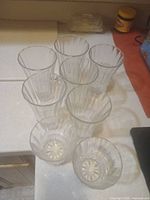 All eight glasses grouped to show quantity and design