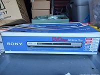 Front view of Sony DVP-NS75H boxed DVD player