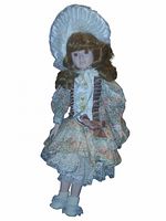 Front view of porcelain doll on stand showing entire outfit, bonnet and shoes