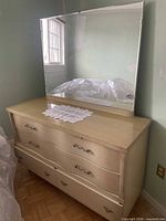 Front view showing dresser and mirror