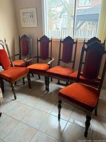 Group shot of all six chairs against window