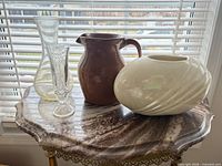 All four items on marble-top table