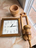All three items grouped: Seiko clock, pedestal bowl, wall sconce