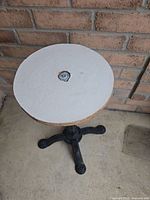 Top view highlighting MDF surface and central bolt