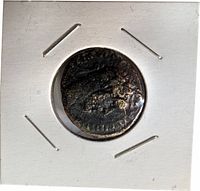 Obverse in flip showing profile bust