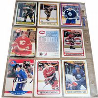 Page showing nine cards including Larry Murphy, Scott Arniel, Alexander Godynyuk, Ken Sabourin, Steve Chiasson, Craig Wolanin, Kevin Hatcher, Mike Hartman