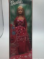 Front view of boxed Season's Sparkle Barbie