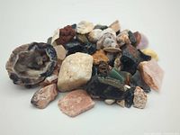 Pile of mixed rocks, minerals, crystals, geode pieces