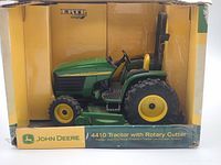 Full boxed view of Ertl John Deere 4410 tractor model