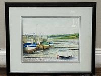 Full view of framed print under glass