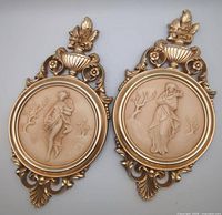 Pair of Syroco goddess cameo wall plaques front view