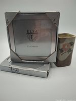 Boxed Elsa frames and ceramic holder grouped