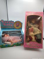 Lovely Baby and Barbara Lee dolls side by side in original boxes