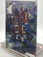 Stack topped with Transformers comic showing cover art