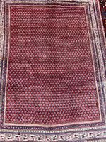 Full view of red Mir paisley rug