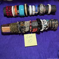 Full view of two rods showing entire assortment of bracelets and bangles