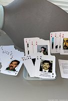 Spread of cards showing faces, suits and completeness of deck