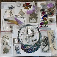Full layout of assorted jewelry pieces and components