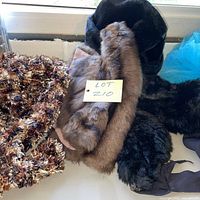 Brown and black mink collars knit scarf and book overall view