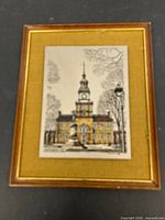 Frontal view of framed titanium etching