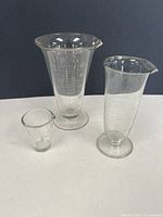 Group shot of the three glass measures showing relative sizes and shapes