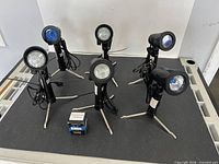 all six lights on tripods with cords and boxed Eiko bulb