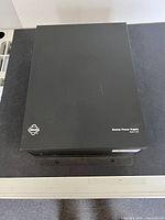 Top view of Pelco MCS16-10 power supply showing logo and labeling