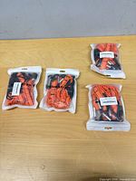 Four sealed BlueStraw packs on table