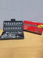 open case showing all 46 pieces arranged