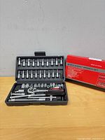 Open case showing full 46-piece socket set contents