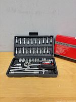 Open case showing full 46-piece socket set and accessories
