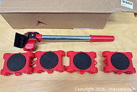 Contents laid out: four sliders, one lever, box behind