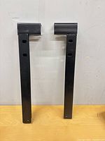 Front view of both vertical bars standing upright