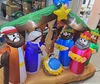Full view of inflated nativity scene showing characters and structure
