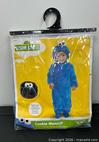 Front view of sealed Sesame Street Cookie Monster costume package
