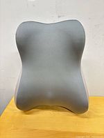 Front view showing overall shape and darker grey front surface