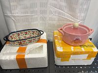 Both ceramic dishes on foam packaging