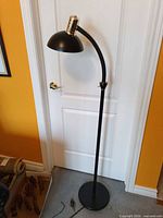 Full view of floor lamp showing height, base, shade and gooseneck