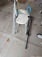 Folded walker, shower stool, walking stick, floral cane