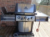 Front view of Broil King Sovereign natural gas barbecue on deck