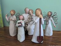 Front view of all five Willow Tree figurines