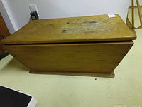 Side view of wooden chest on table