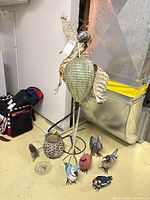 Full group of large heron, small birds, feeder dish and hanging pot