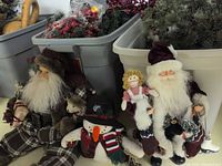 Overview showing wreaths, garlands, Father Christmas figures, snowman and totes