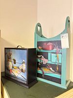 Both hand painted wooden boxes side by side