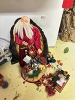Full view of Father Christmas figure with sack and wooden matchbox