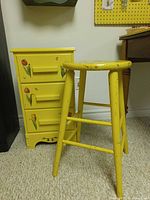 Nightstand and stool together for size and color reference