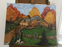 Full view of painting on easel showing entire house landscape scene