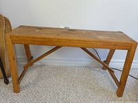 Full view of wood bench front and side